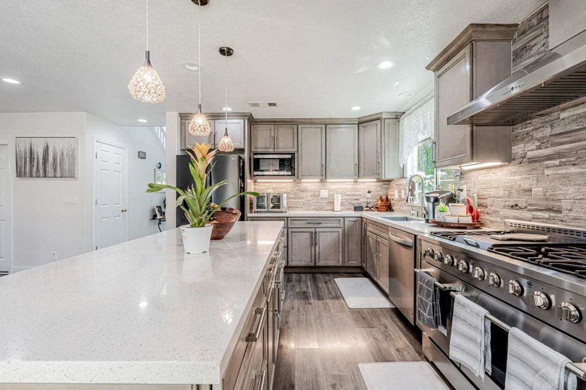 Interior, Kitchen, Pendant Lights, Recessed Lighting, Stainless Steel Appliances, Wood Texture Flooring