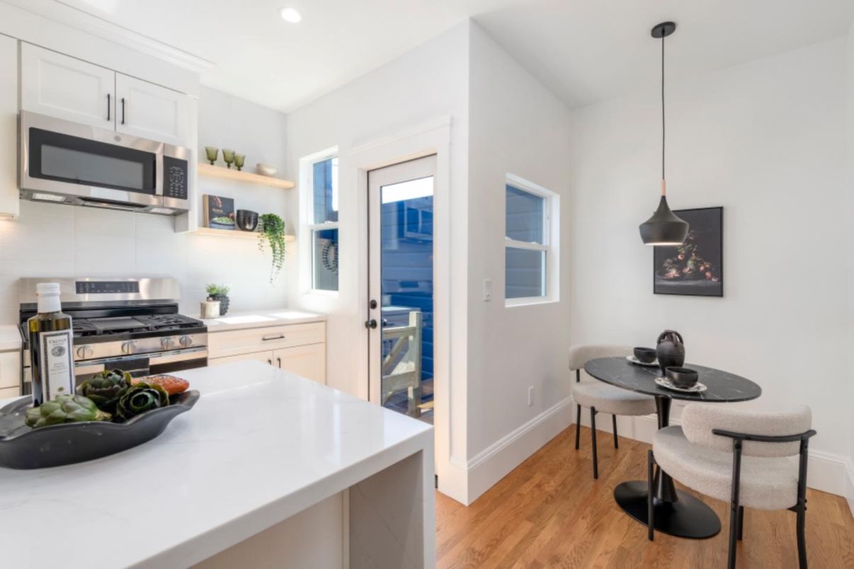 Interior, Kitchen, Pendant Lights, Recessed Lighting, Stainless Steel Appliances, Wood Texture Flooring