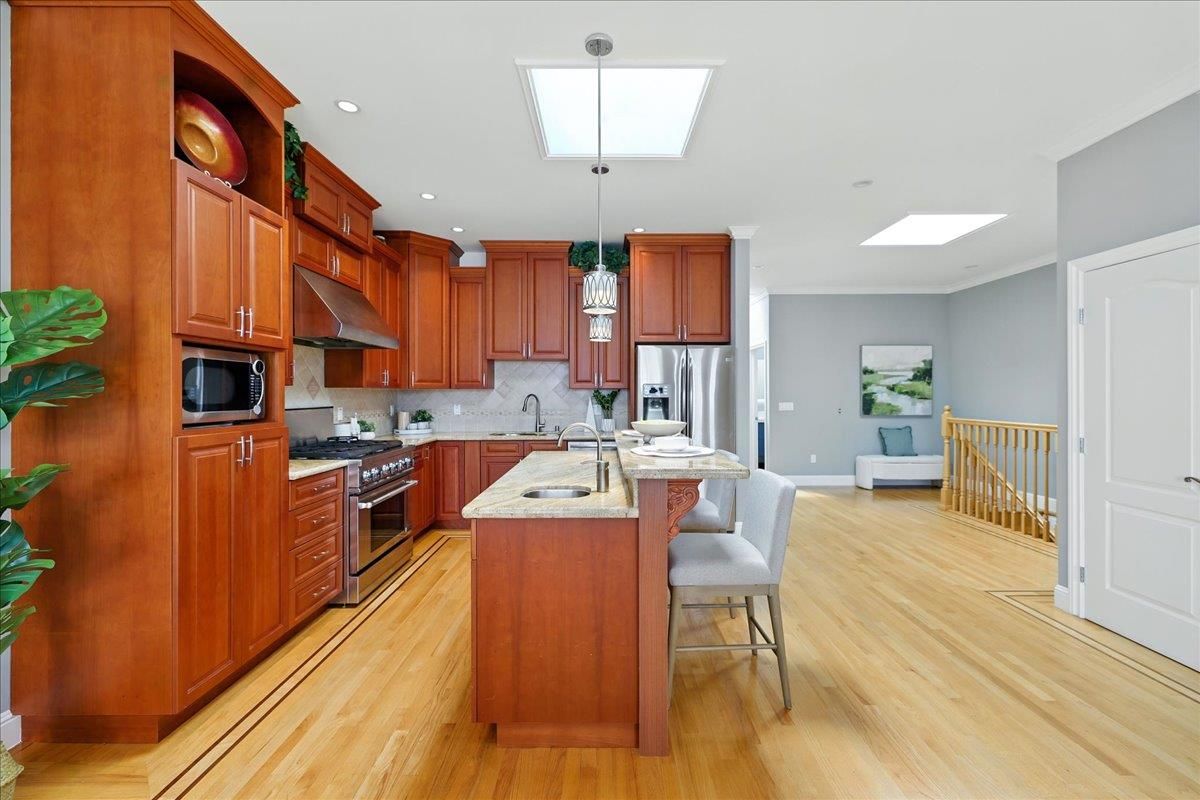 Interior, Kitchen, Pendant Lights, Recessed Lighting, Stainless Steel Appliances, Wood Texture Flooring