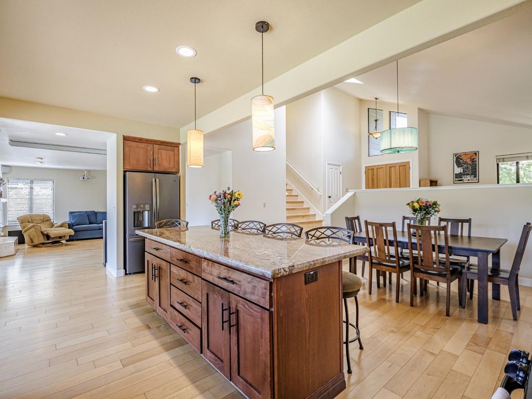 Dining room, Interior, Kitchen, Pendant Lights, Recessed Lighting, Stainless Steel Appliances, Wood Texture Flooring