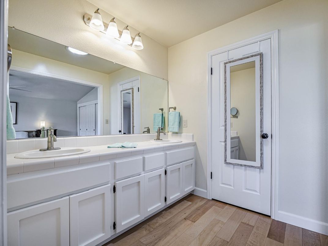 Bathroom, Dual Sink Vanities, Interior, Tile Countertops, Wood Texture Flooring
