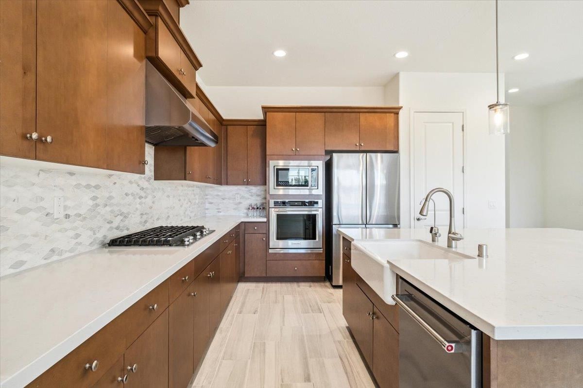 Interior, Kitchen, Pendant Lights, Recessed Lighting, Stainless Steel Appliances, Wood Texture Flooring