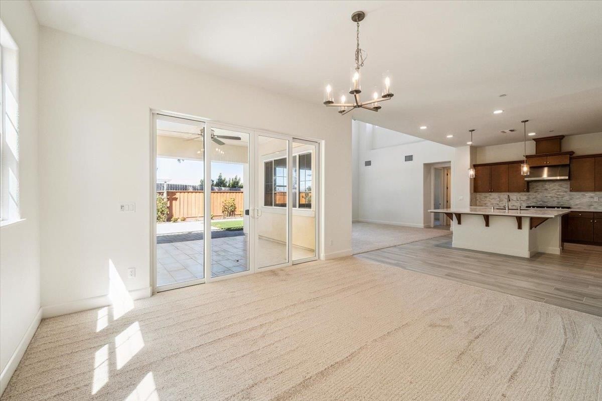 Chandelier, Empty room, Interior, Kitchen, Pendant Lights, Recessed Lighting, Stainless Steel Appliances