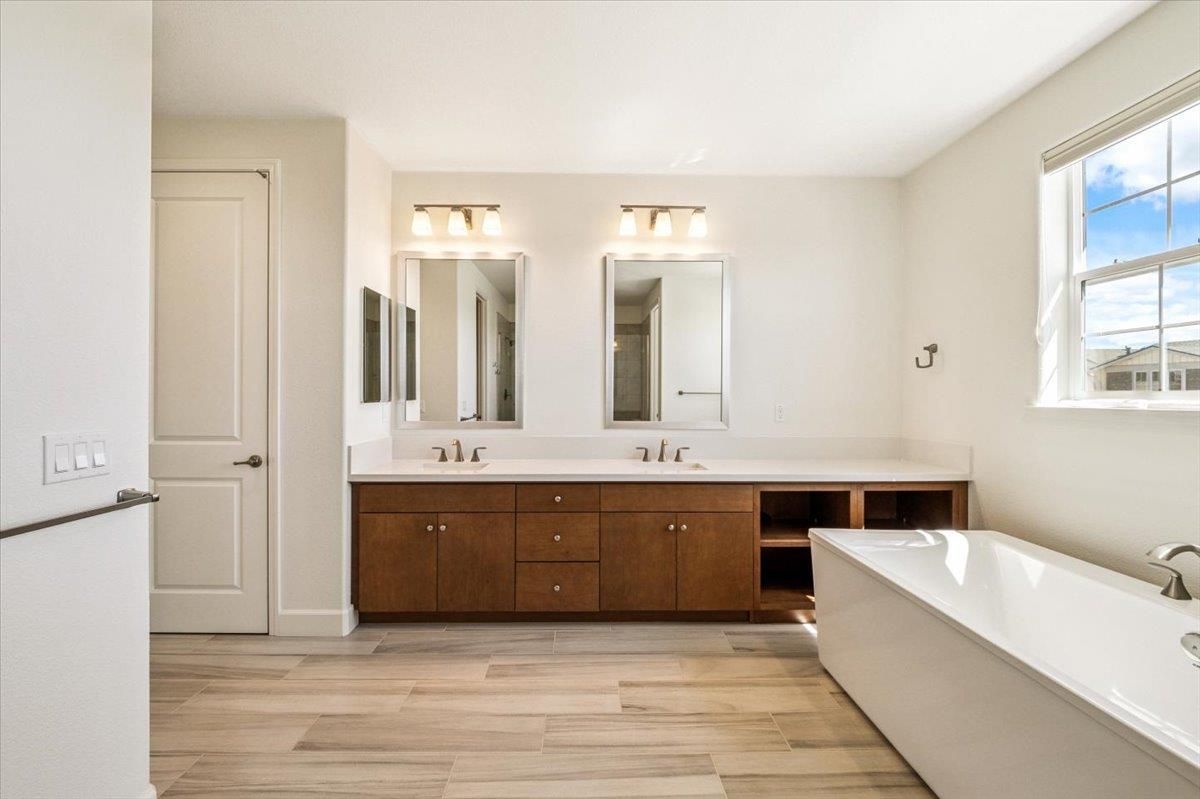 Bathroom, Dual Sink Vanities, Free Standing Baths, Interior, Wood Texture Flooring