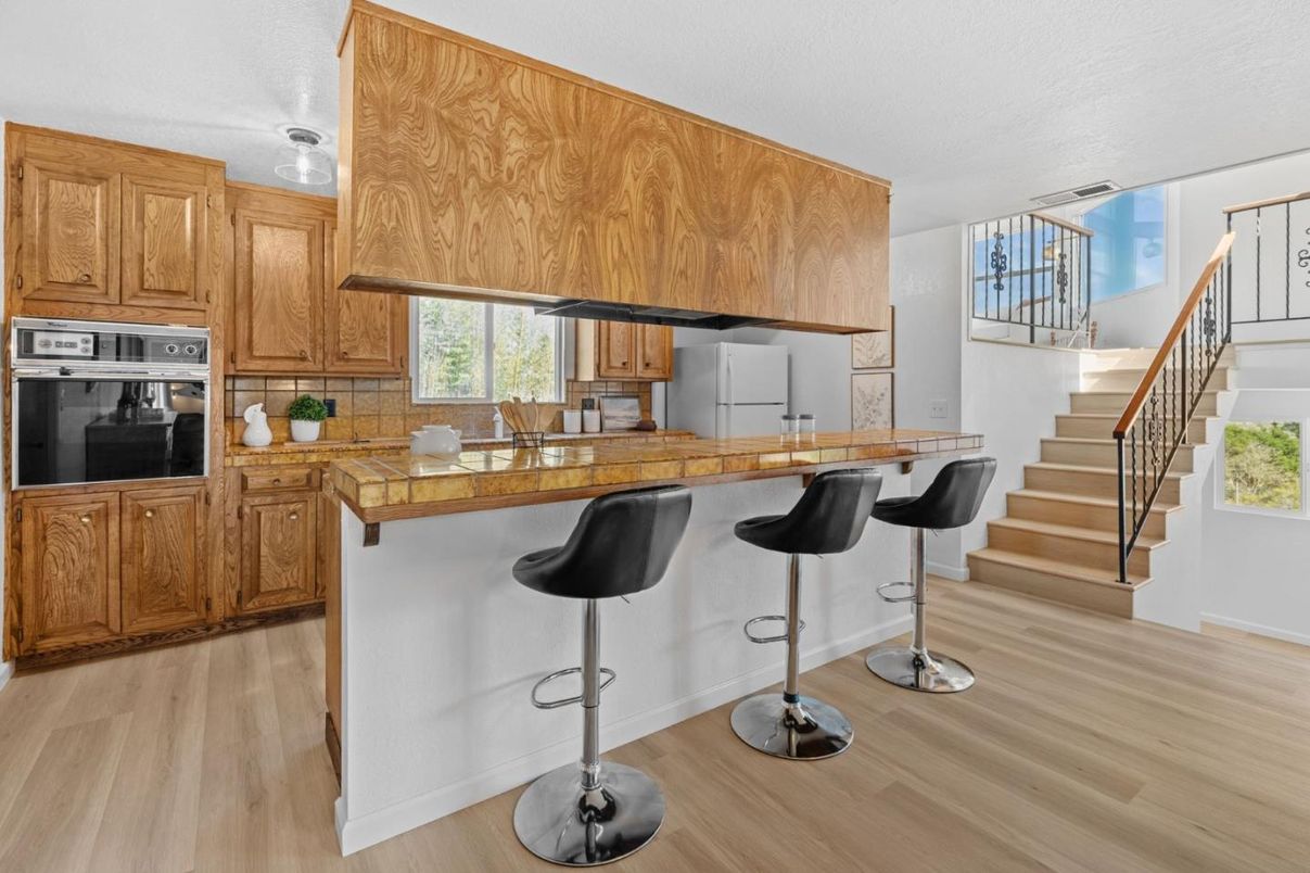 Interior, Kitchen, Tile Countertops, Wood Texture Flooring