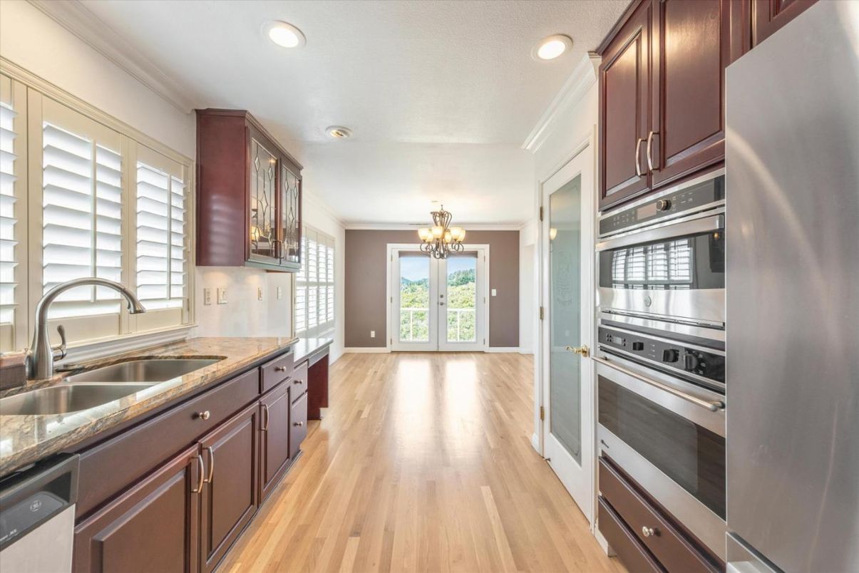 Chandelier, Interior, Kitchen, Recessed Lighting, Stainless Steel Appliances, Wood Texture Flooring