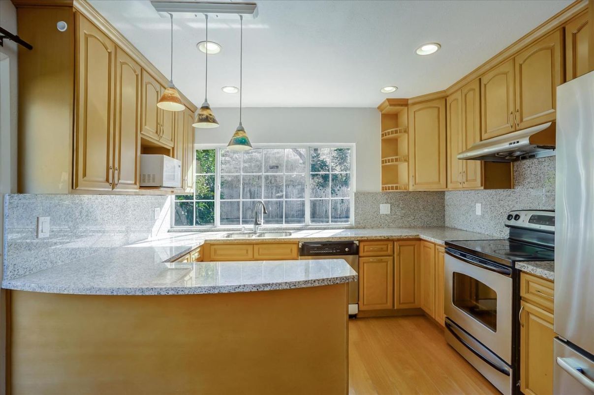 Interior, Kitchen, Pendant Lights, Recessed Lighting, Stainless Steel Appliances, Wood Texture Flooring