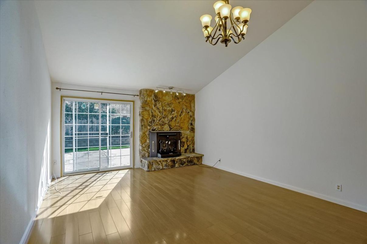 Chandelier, Empty room, Fireplace, Interior, Wood Texture Flooring