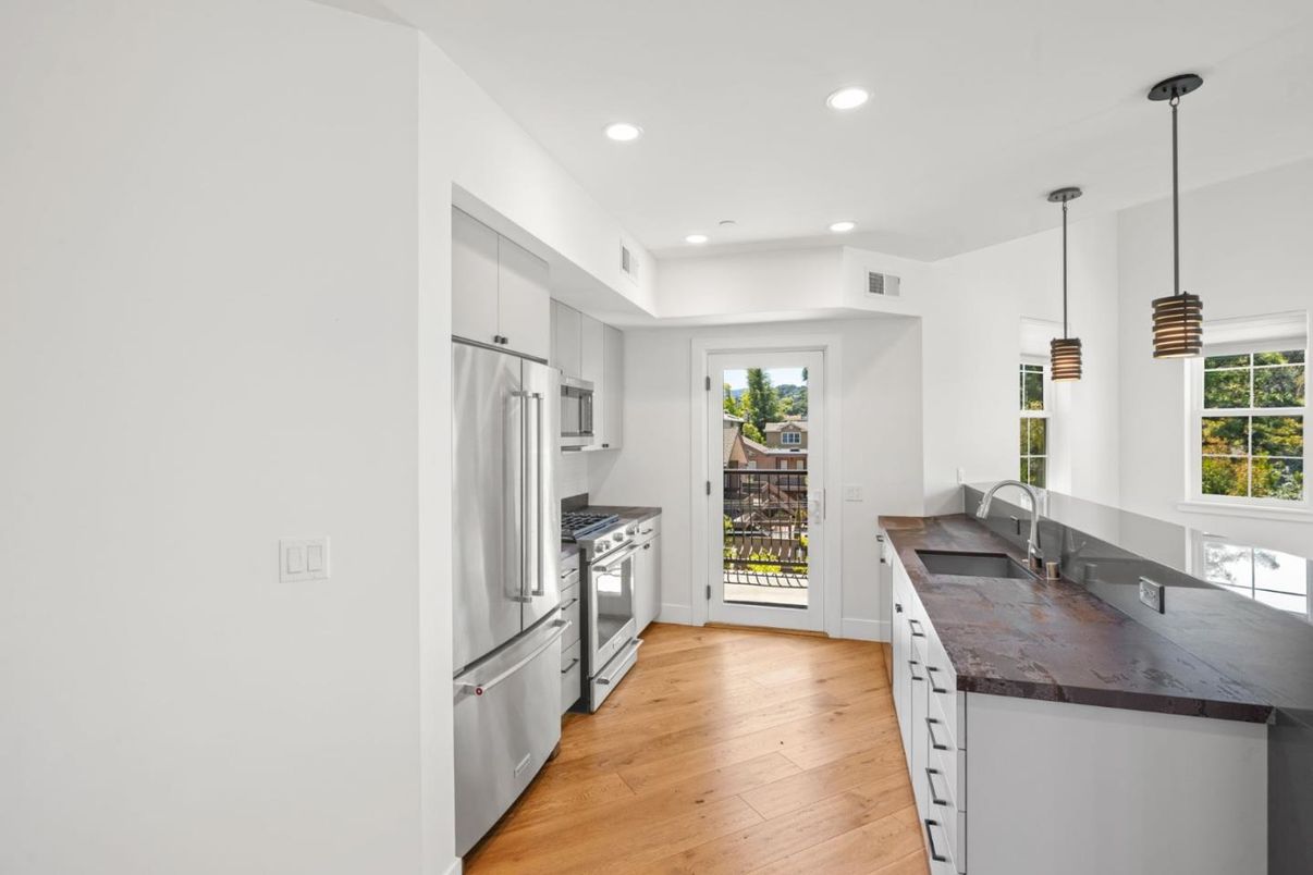 Interior, Kitchen, Pendant Lights, Recessed Lighting, Stainless Steel Appliances, Wood Texture Flooring