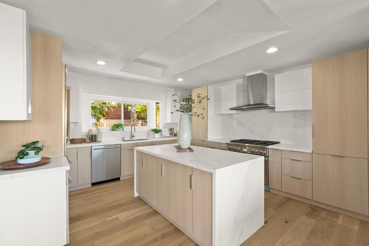 Interior, Kitchen, Marble Walls, Recessed Lighting, Stainless Steel Appliances, Wood Texture Flooring