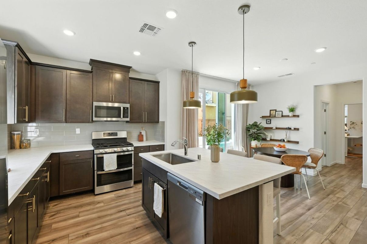 Dining room, Interior, Kitchen, Pendant Lights, Recessed Lighting, Stainless Steel Appliances, Wood Texture Flooring