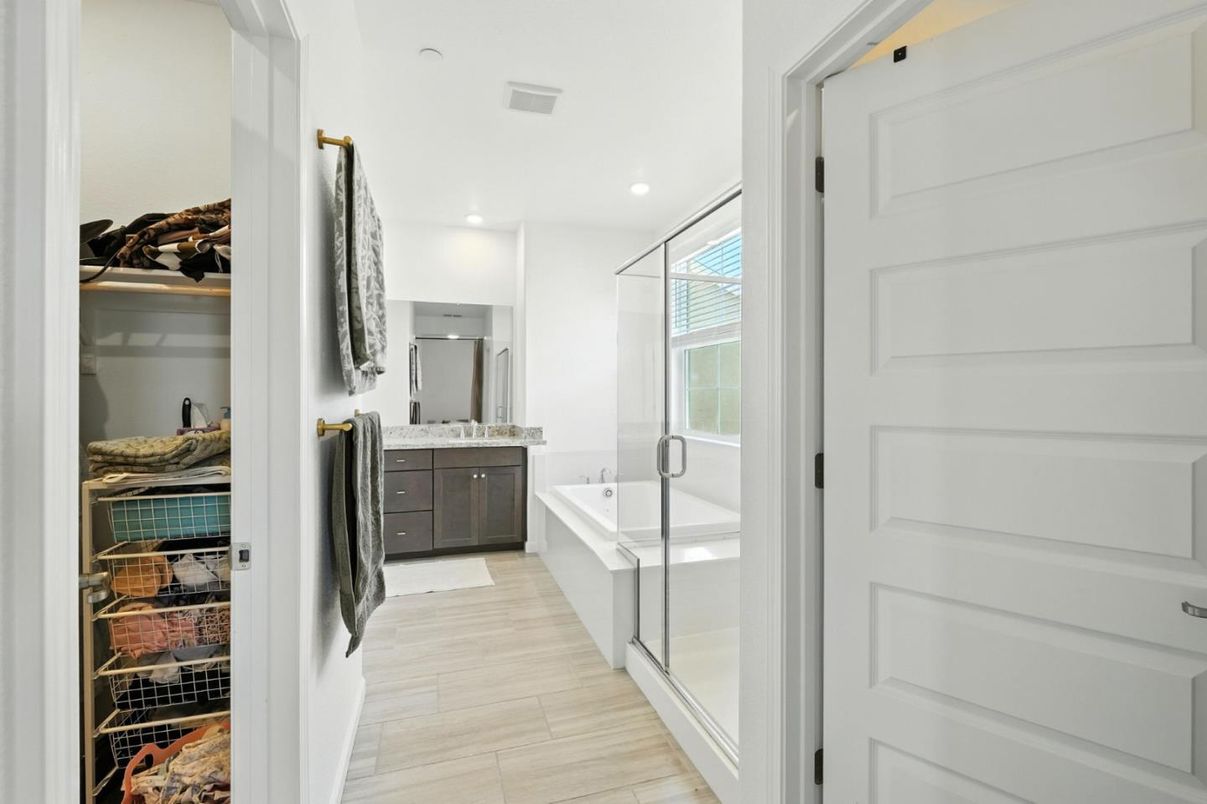 Bathroom, Dual Sink Vanities, Glass Shower, Interior, Recessed Lighting, Walk-in Closets