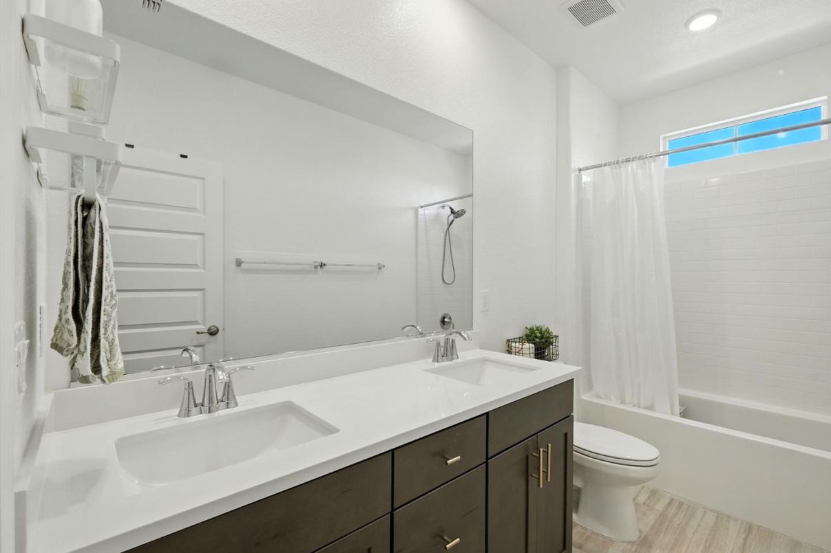 Bathroom, Dual Sink Vanities, Interior, Recessed Lighting, Wood Texture Flooring