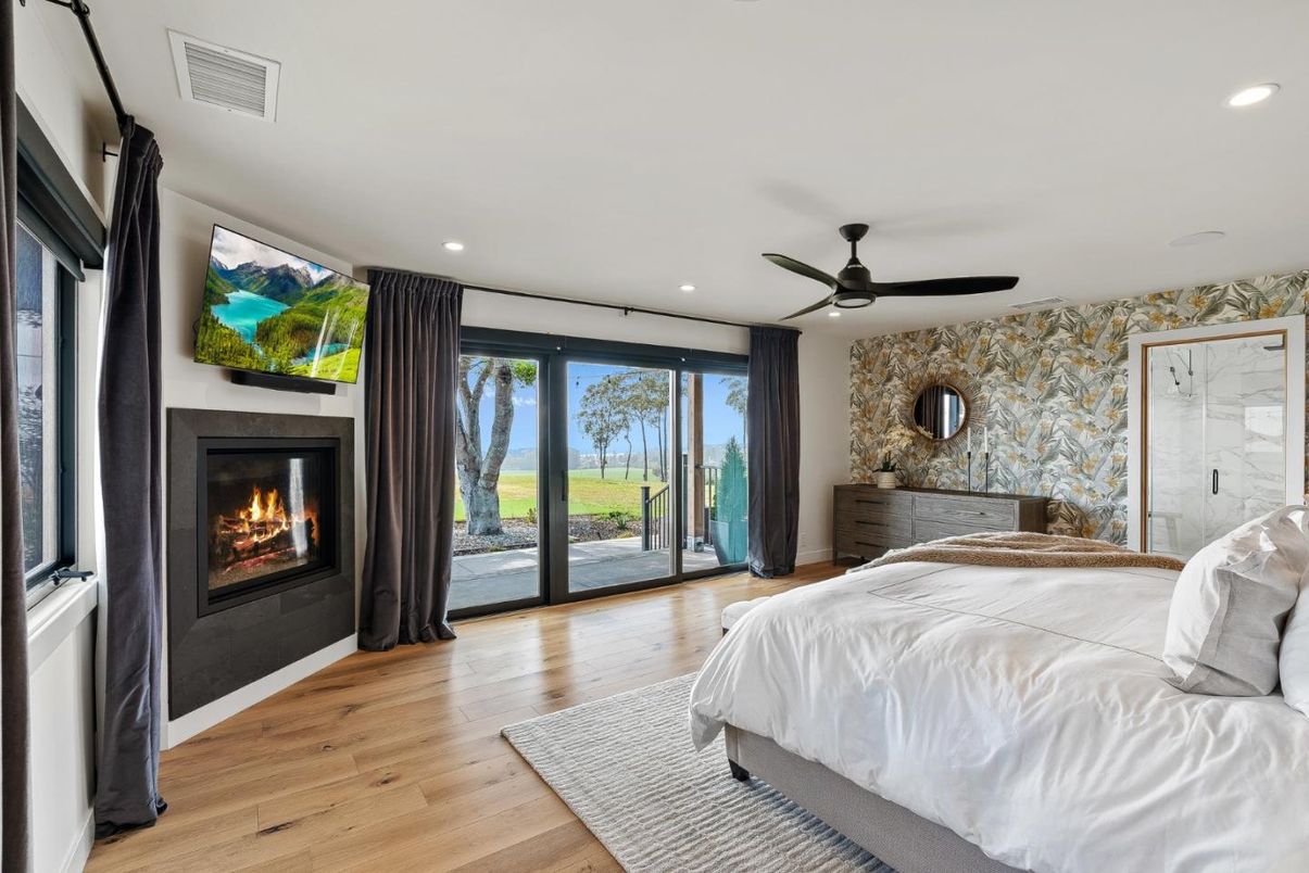 Bedroom, Fireplace, Interior, Recessed Lighting, Wood Texture Flooring