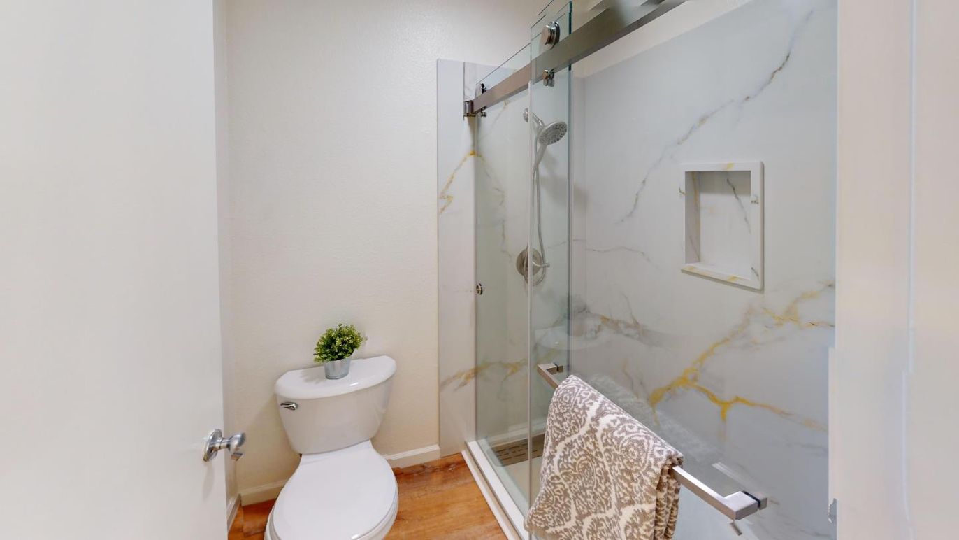 Bathroom, Glass Shower, Interior, Marble Walls, Wood Texture Flooring