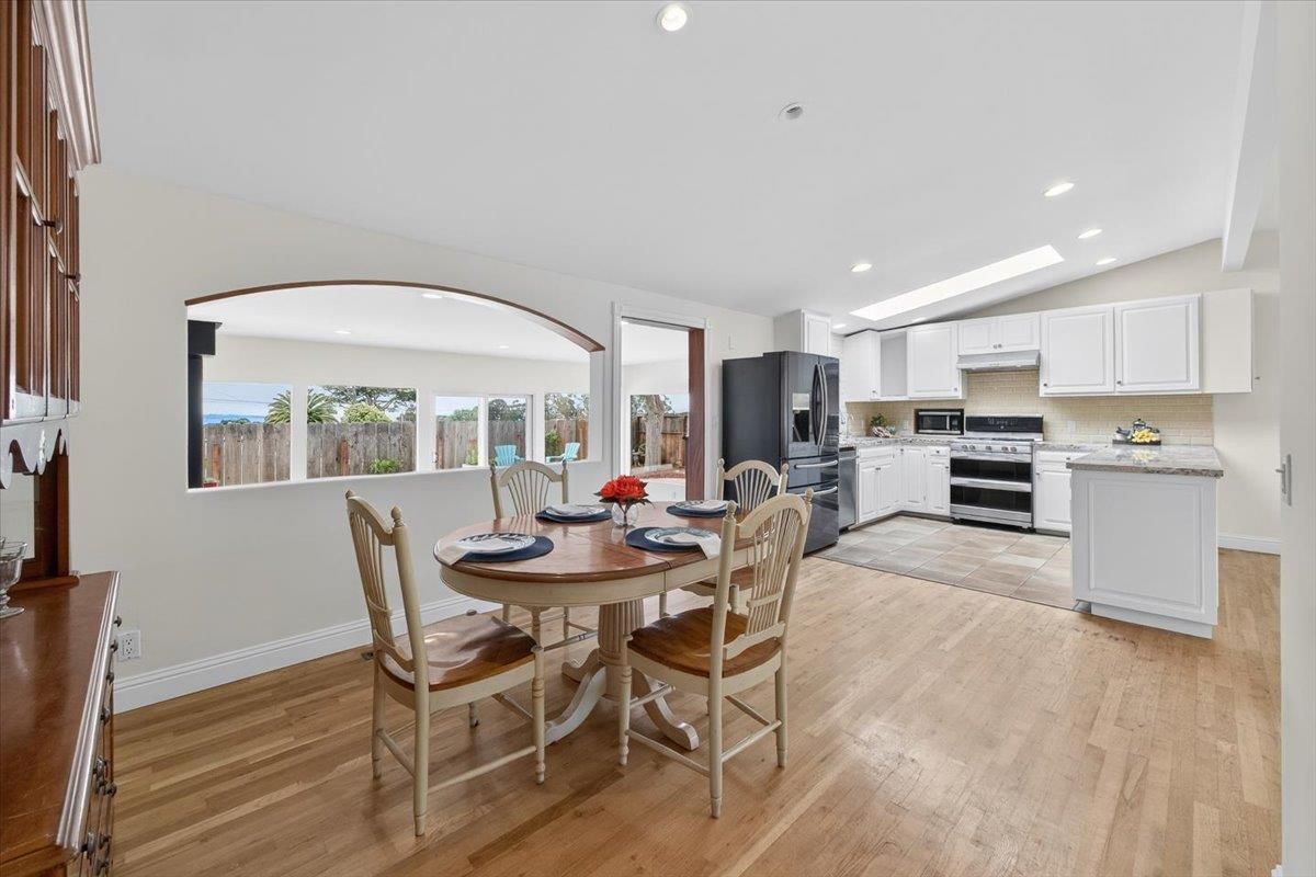 Dining room, Interior, Kitchen, Recessed Lighting, Stainless Steel Appliances, Wood Texture Flooring