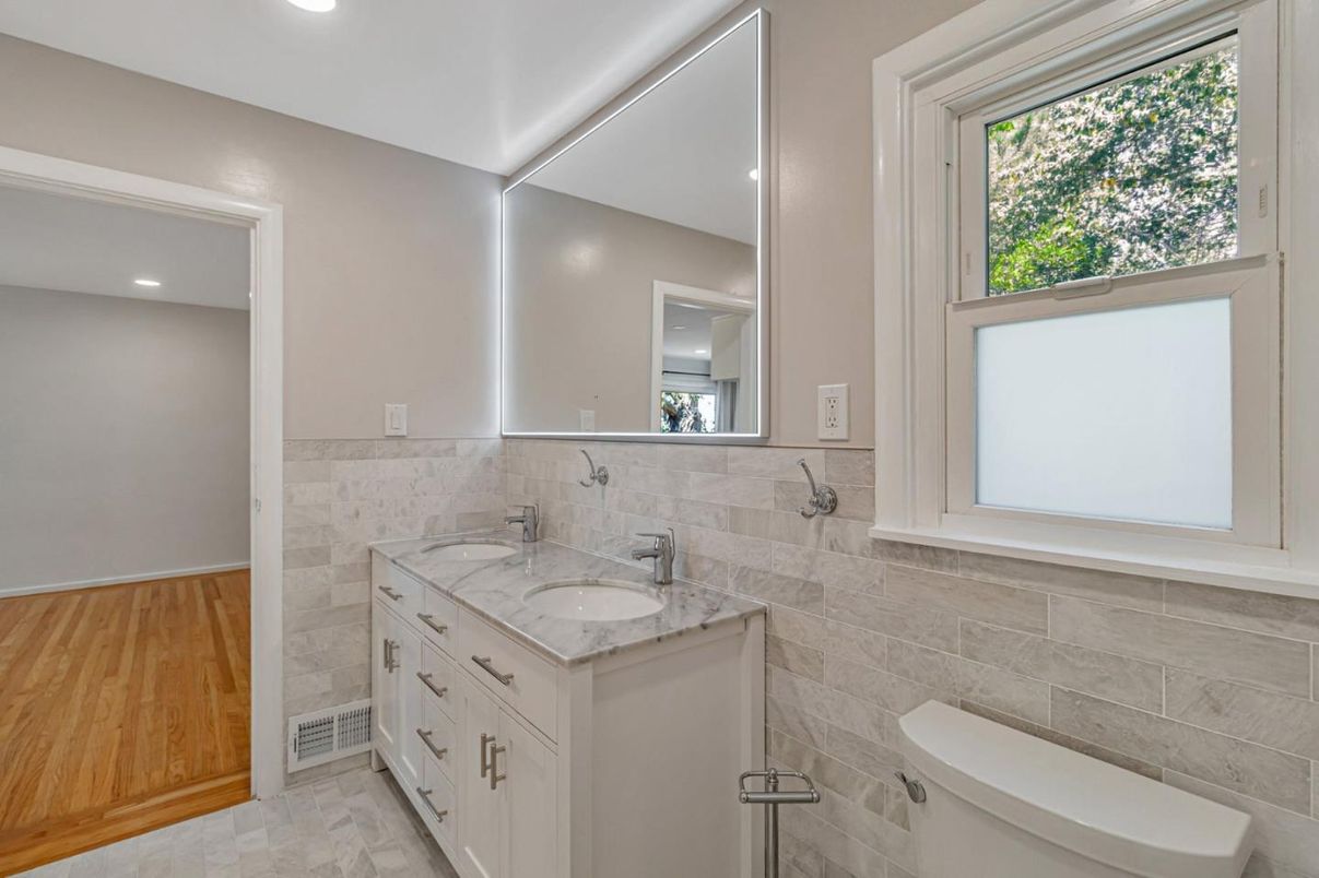 Bathroom, Dual Sink Vanities, Interior, Recessed Lighting, Wood Texture Flooring