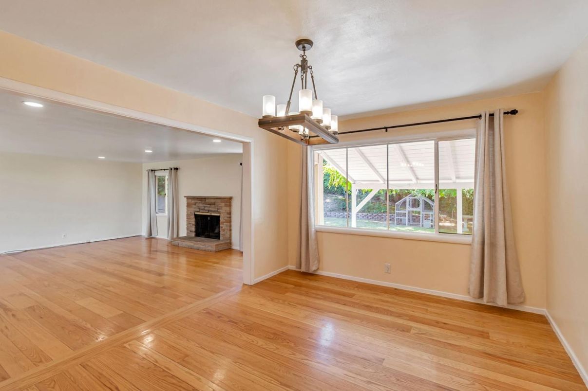 Chandelier, Empty room, Fireplace, Interior, Pendant Lights, Recessed Lighting, Wood Texture Flooring