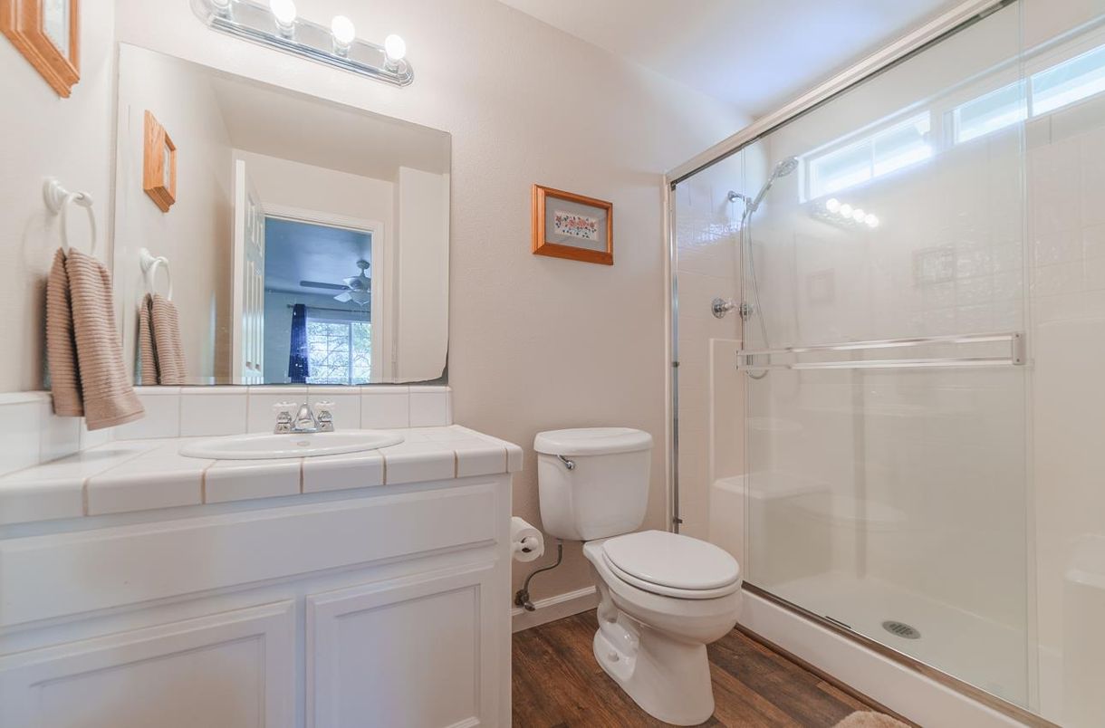 Bathroom, Glass Shower, Interior, Tile Countertops, Wood Texture Flooring