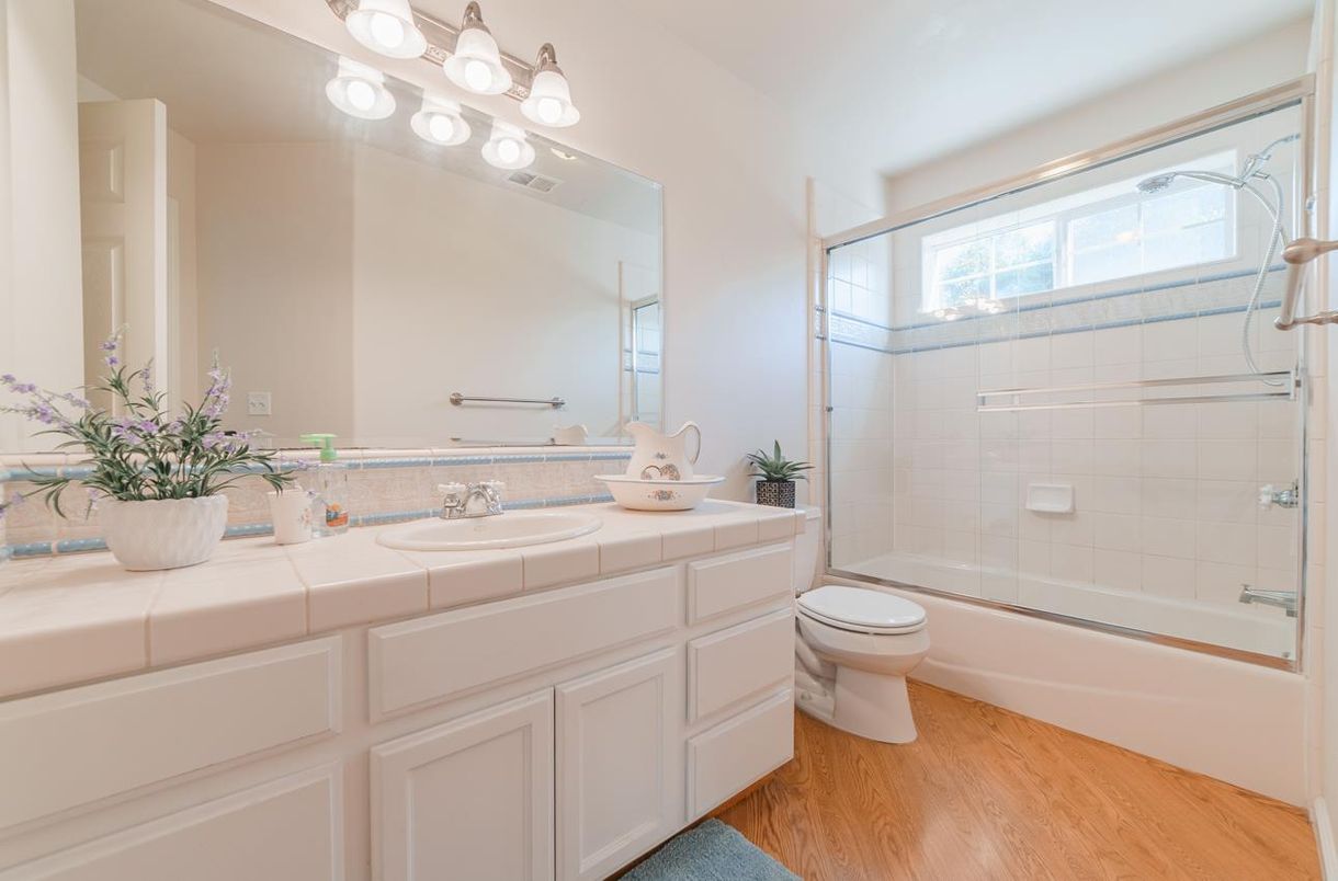 Bathroom, Glass Shower, Interior, Tile Countertops, Wood Texture Flooring