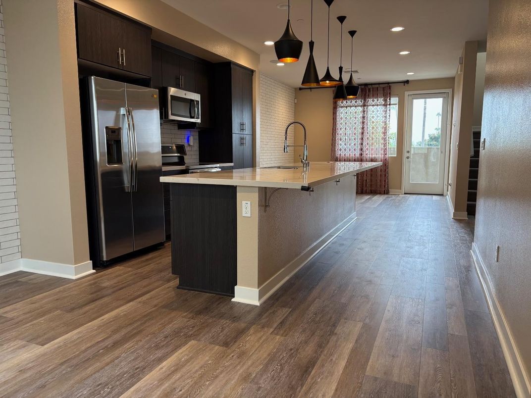 Interior, Kitchen, Pendant Lights, Recessed Lighting, Stainless Steel Appliances, Wood Texture Flooring