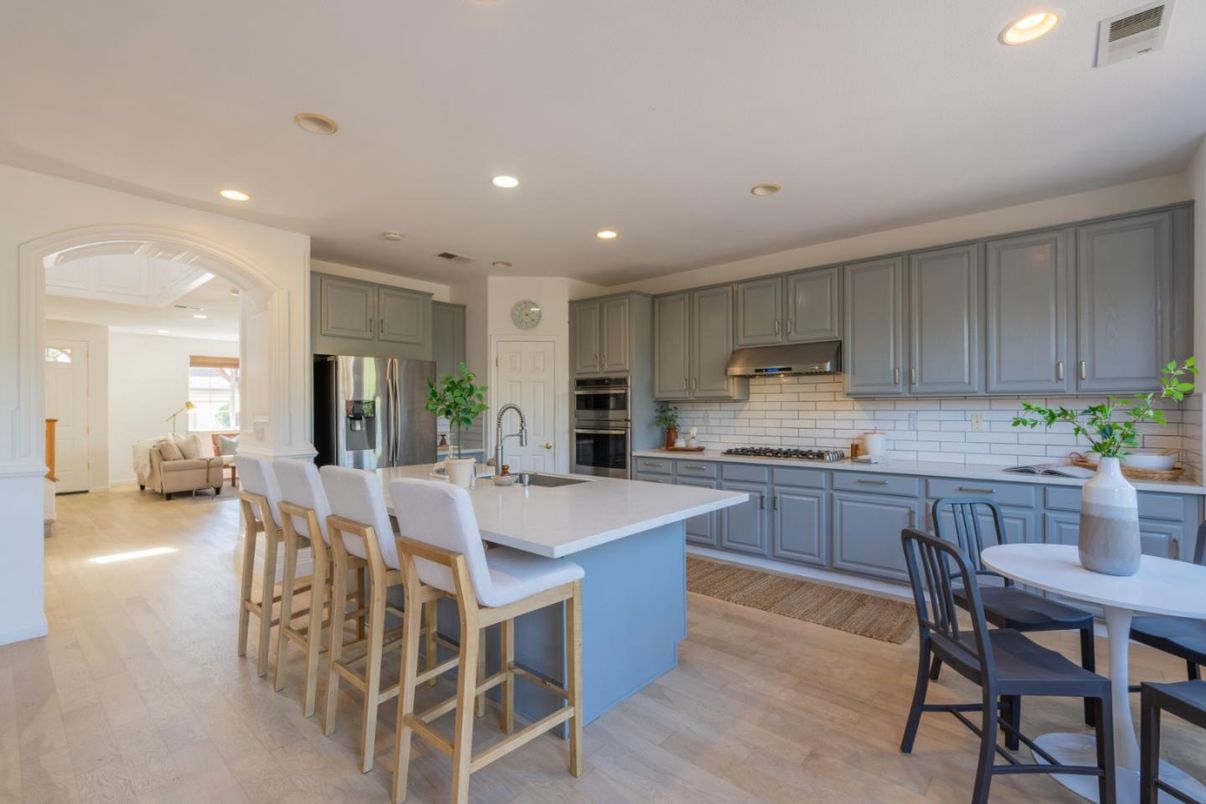Dining room, Interior, Kitchen, Recessed Lighting, Stainless Steel Appliances, Wood Texture Flooring