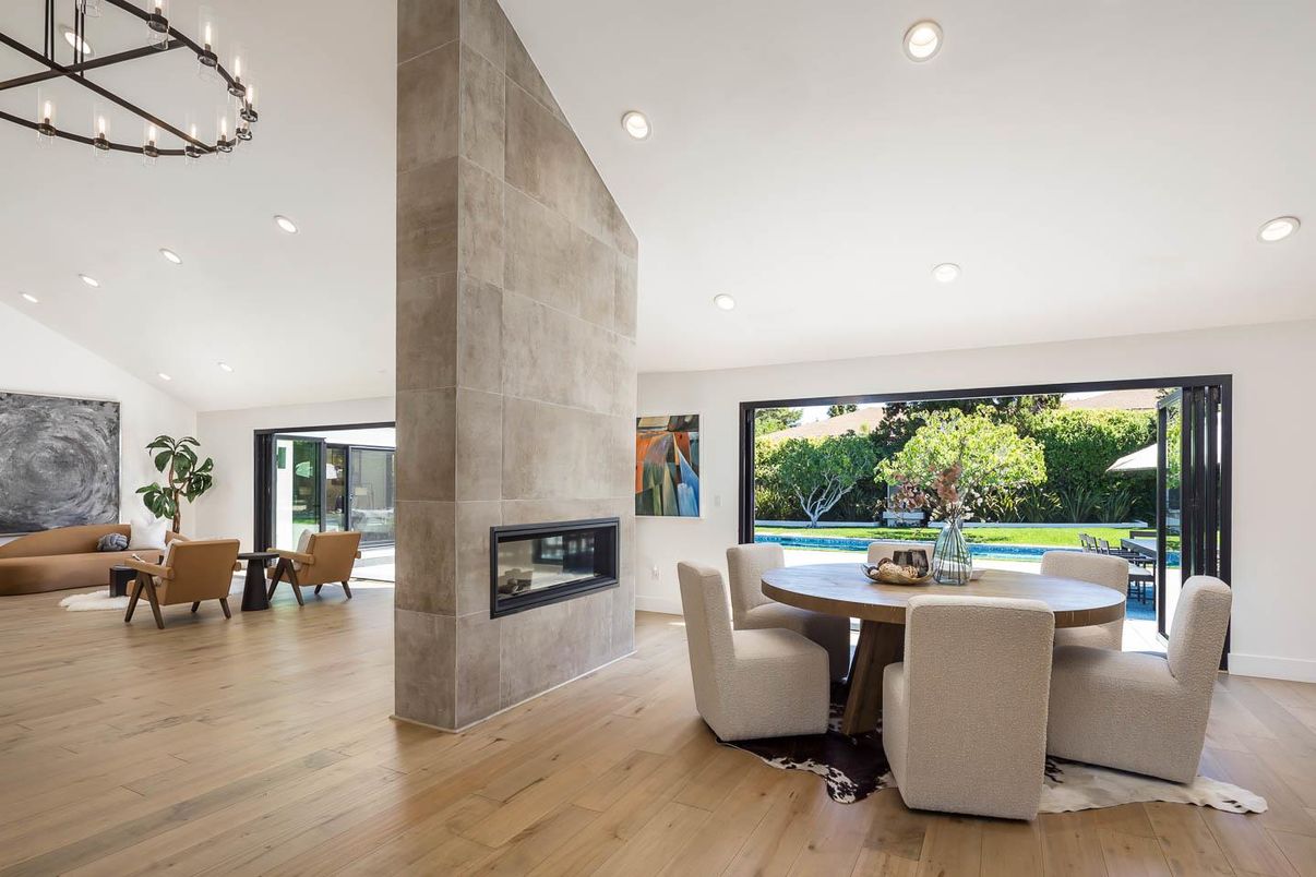 Dining room, Fireplace, Interior, Living room, Recessed Lighting, Wood Texture Flooring