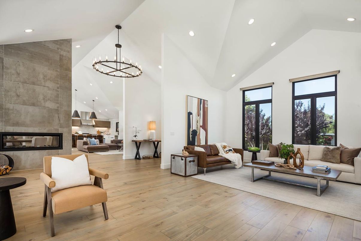 Chandelier, Fireplace, Interior, Living room, Pendant Lights, Recessed Lighting, Wood Texture Flooring
