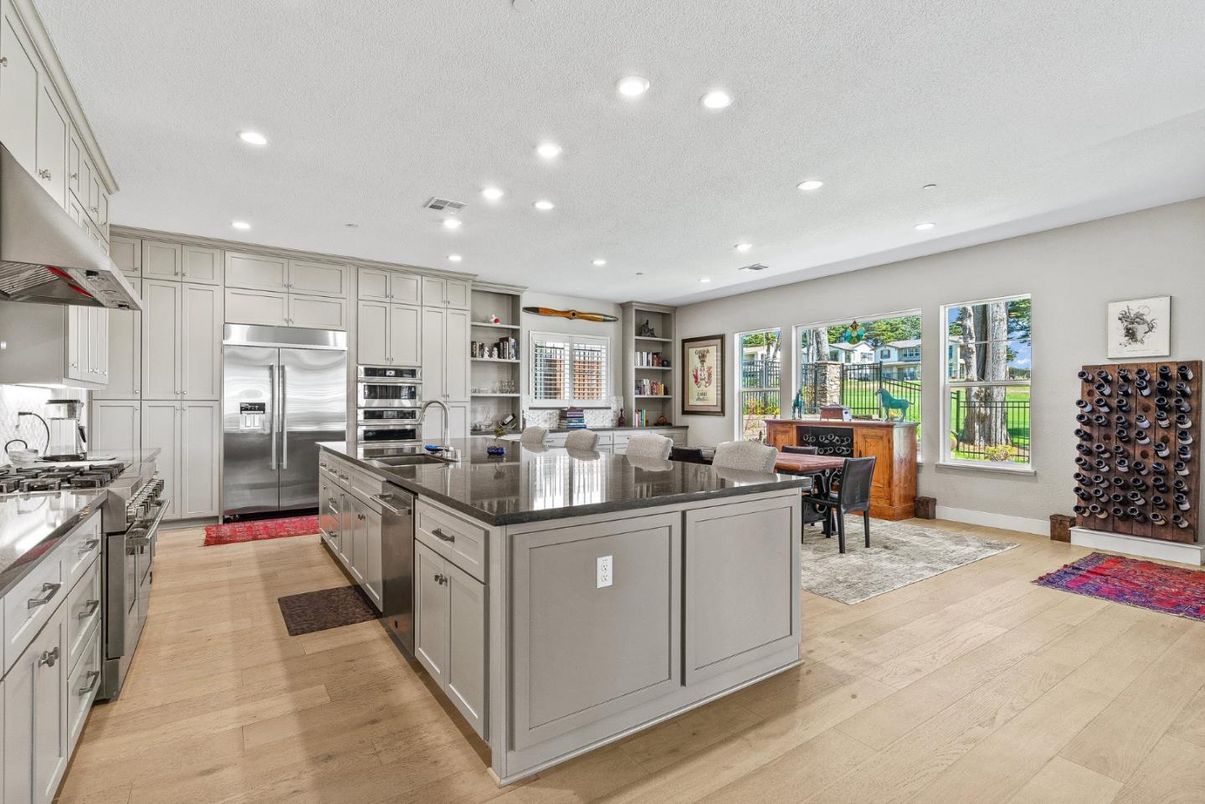 Dining room, Interior, Kitchen, Recessed Lighting, Stainless Steel Appliances, Wood Texture Flooring
