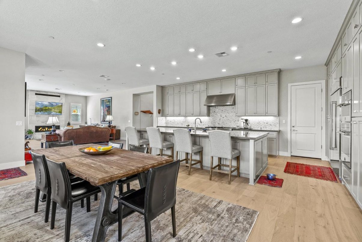Dining room, Interior, Kitchen, Recessed Lighting, Stainless Steel Appliances, Wood Texture Flooring