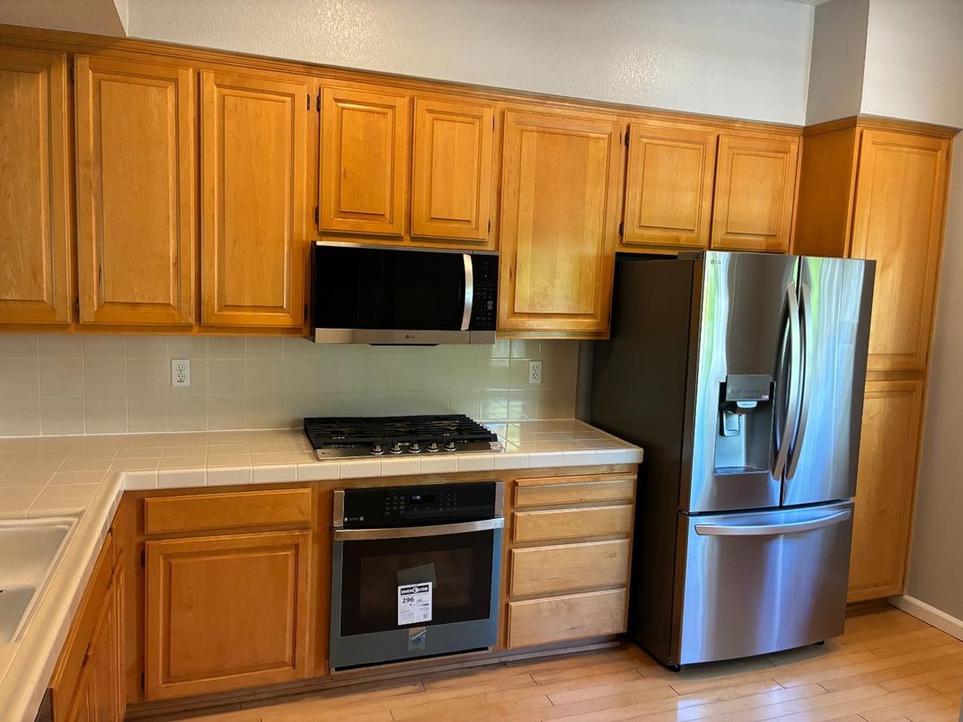 Interior, Kitchen, Tile Countertops, Wood Texture Flooring