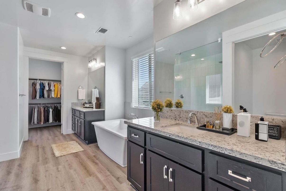 Bathroom, Dual Sink Vanities, Free Standing Baths, Interior, Recessed Lighting, Wood Texture Flooring