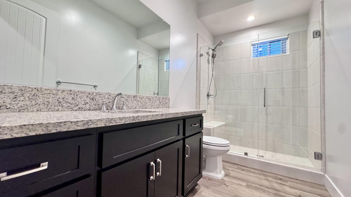 Bathroom, Glass Shower, Interior, Recessed Lighting, Wood Texture Flooring