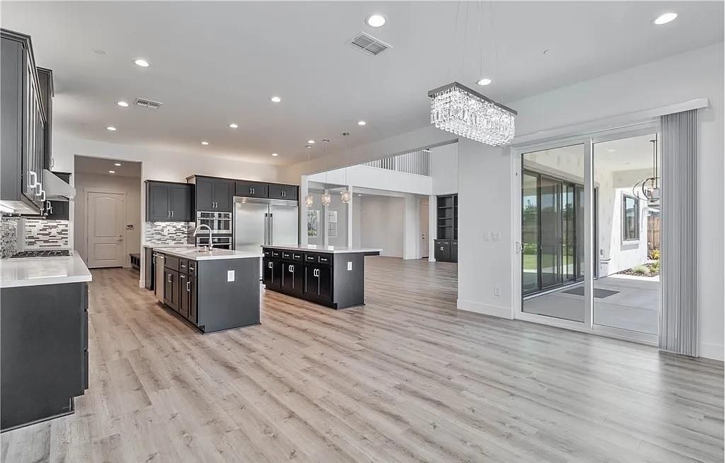 Chandelier, Interior, Kitchen, Recessed Lighting, Stainless Steel Appliances, Wood Texture Flooring