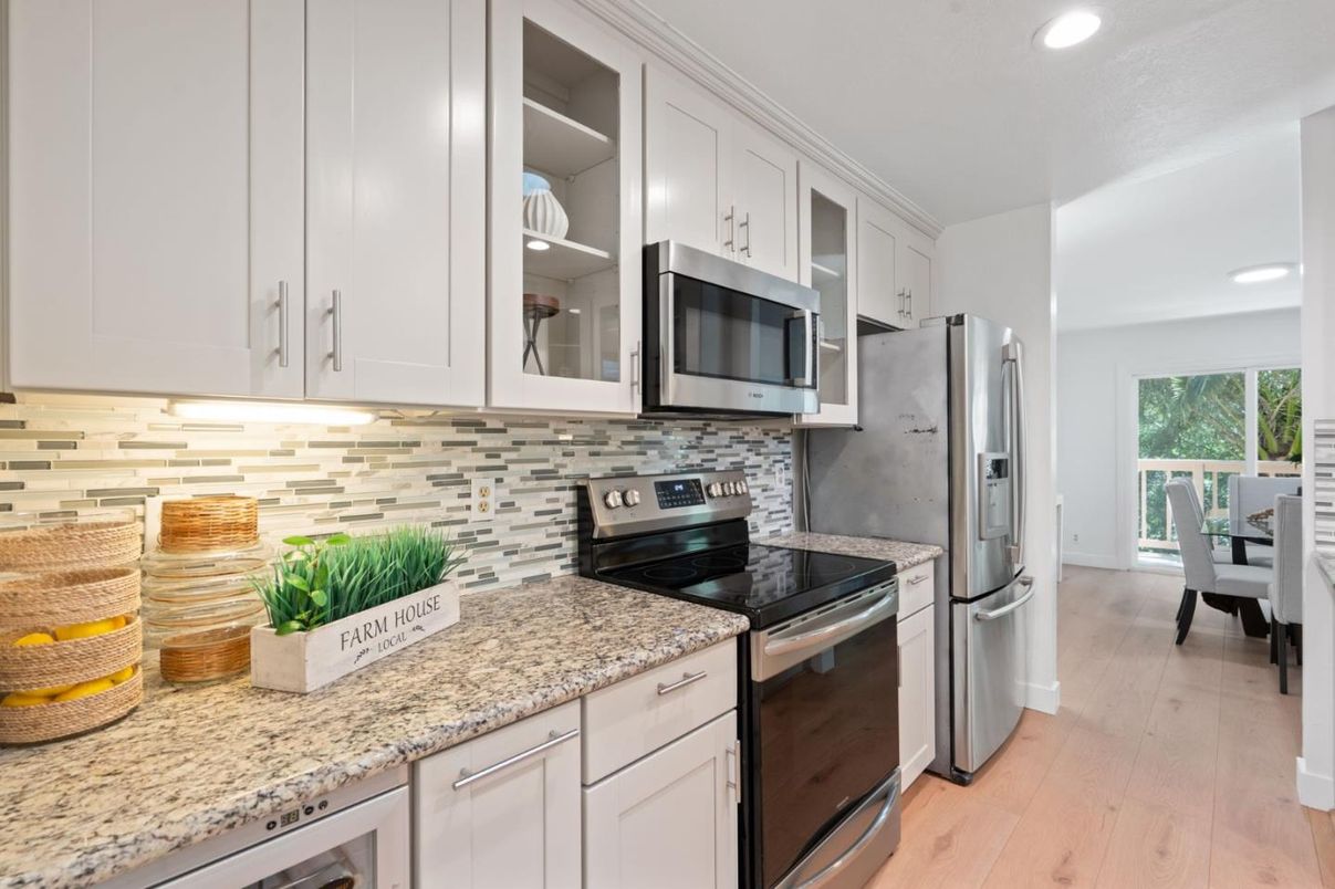 Dining room, Interior, Kitchen, Recessed Lighting, Stainless Steel Appliances, Wood Texture Flooring