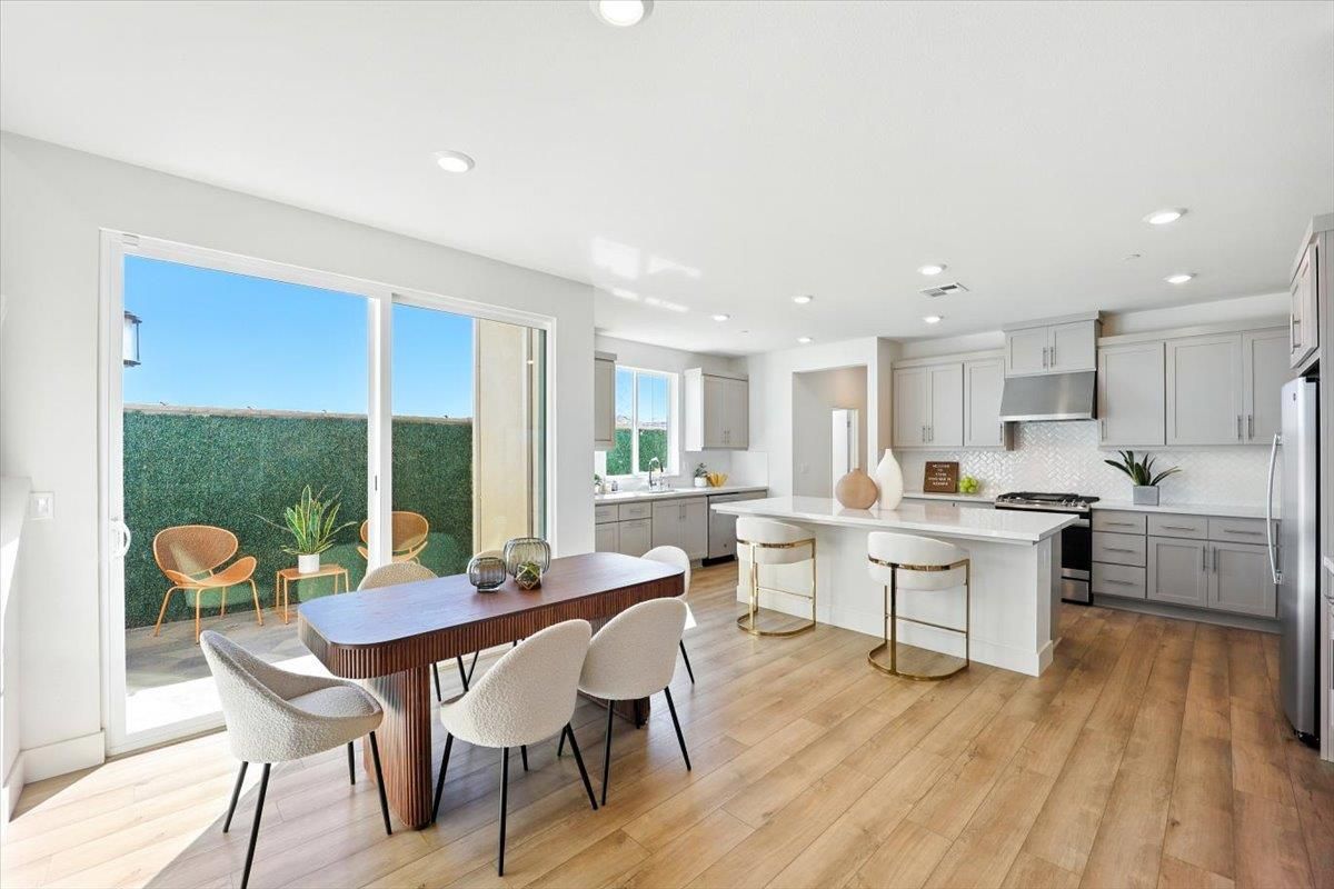 Dining room, Interior, Kitchen, Recessed Lighting, Stainless Steel Appliances, Wood Texture Flooring