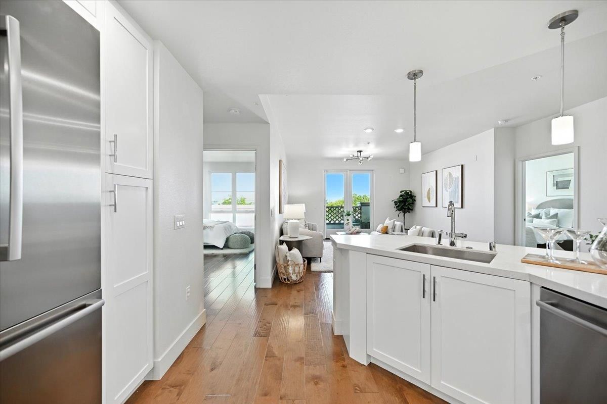 Bedroom, Interior, Kitchen, Living room, Pendant Lights, Recessed Lighting, Stainless Steel Appliances, Wood Texture Flooring
