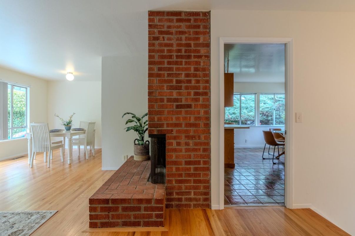 Dining room, Fireplace, Interior, Stone Walls, Wood Texture Flooring