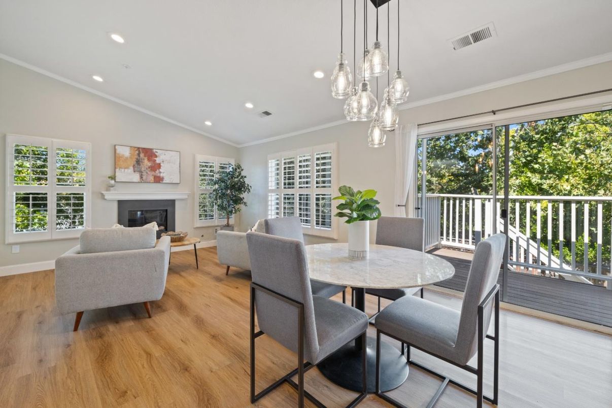 Dining room, Fireplace, Interior, Living room, Pendant Lights, Recessed Lighting, Wood Texture Flooring