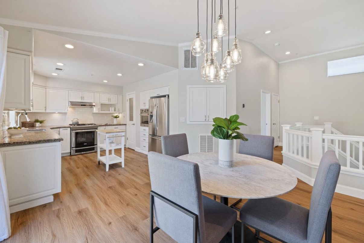 Dining room, Interior, Kitchen, Pendant Lights, Recessed Lighting, Stainless Steel Appliances, Wood Texture Flooring