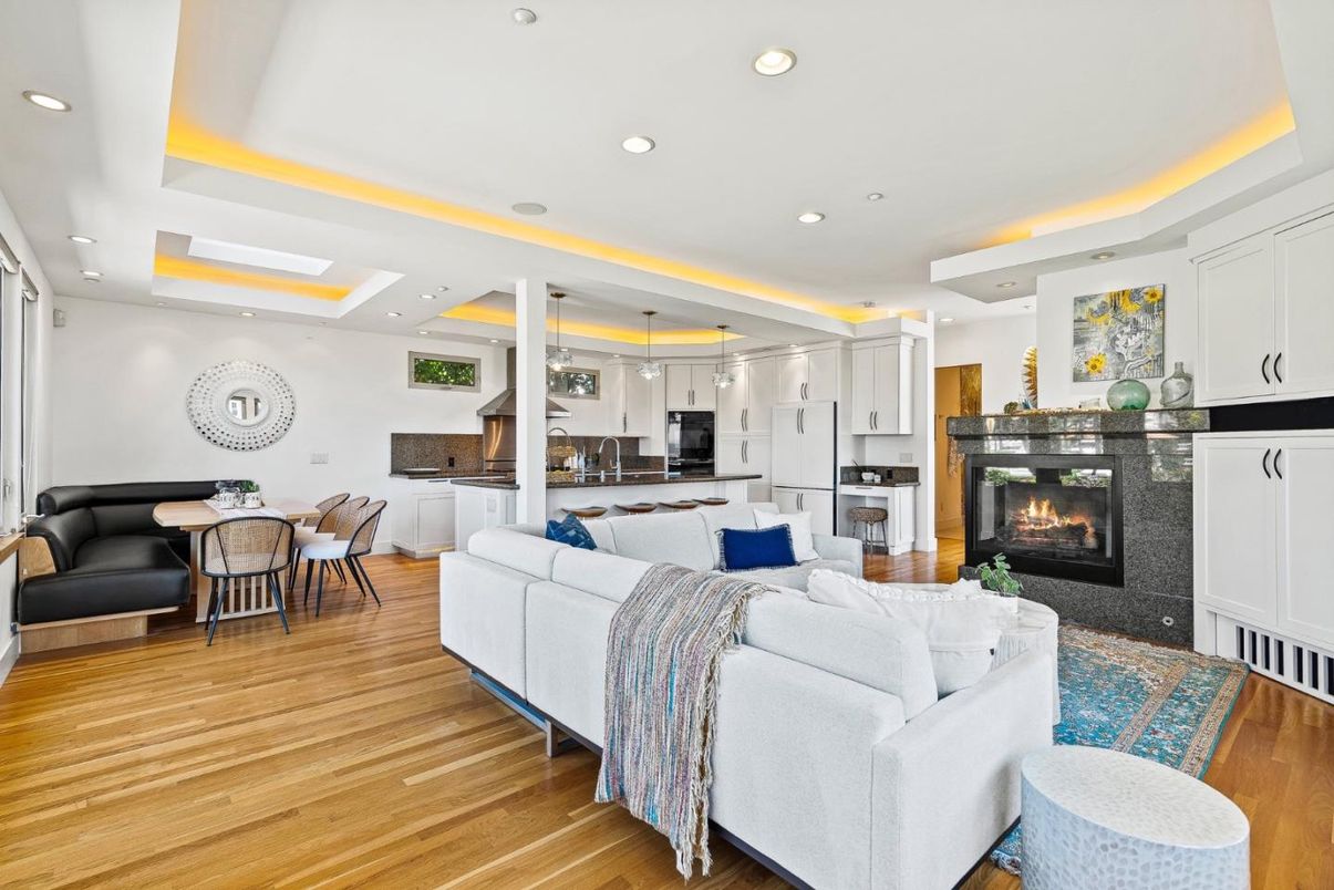 Dining room, Fireplace, Interior, Kitchen, Living room, Pendant Lights, Recessed Lighting, Stainless Steel Appliances, Wood Texture Flooring