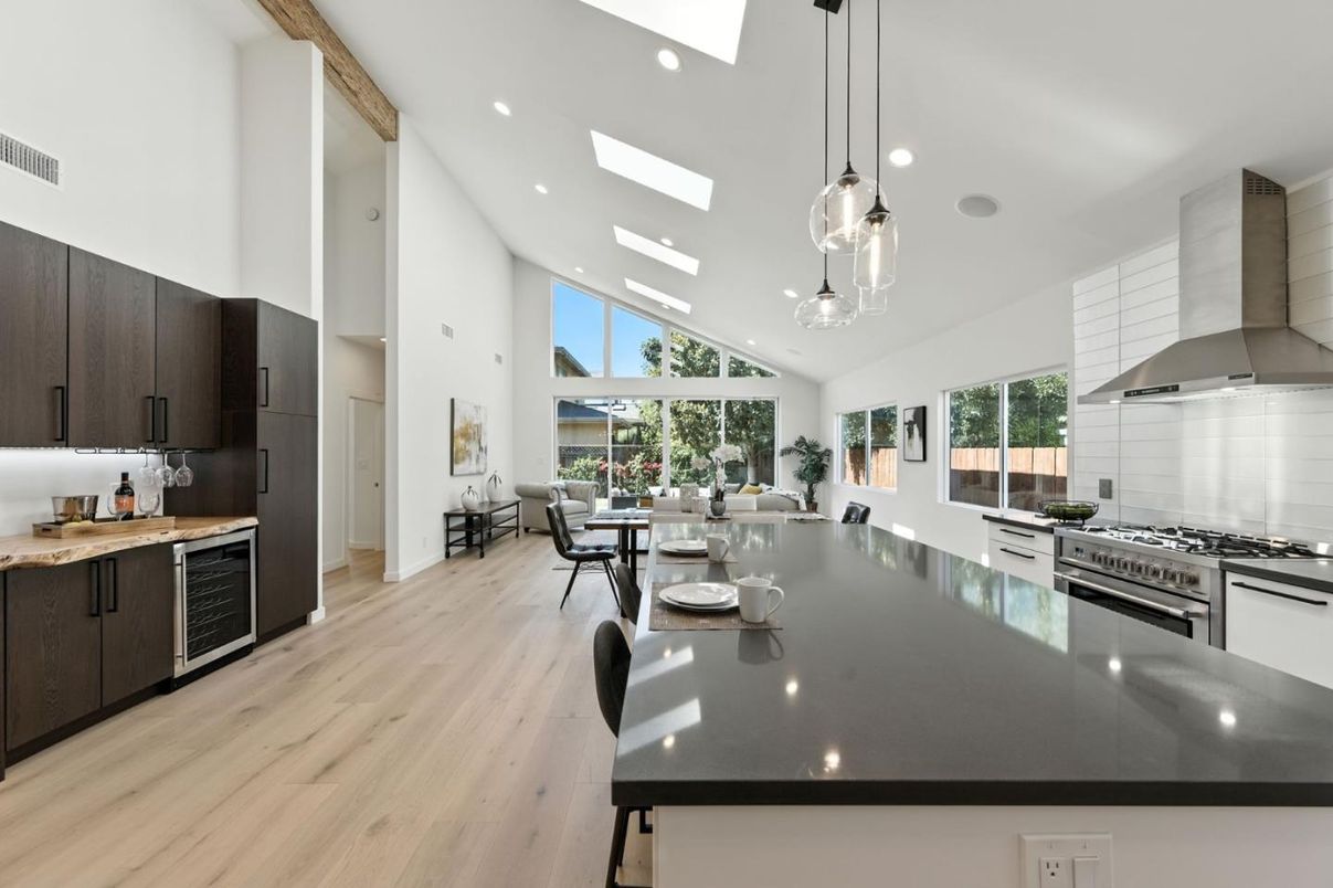 Dining room, Interior, Kitchen, Pendant Lights, Recessed Lighting, Stainless Steel Appliances, Wood Texture Flooring