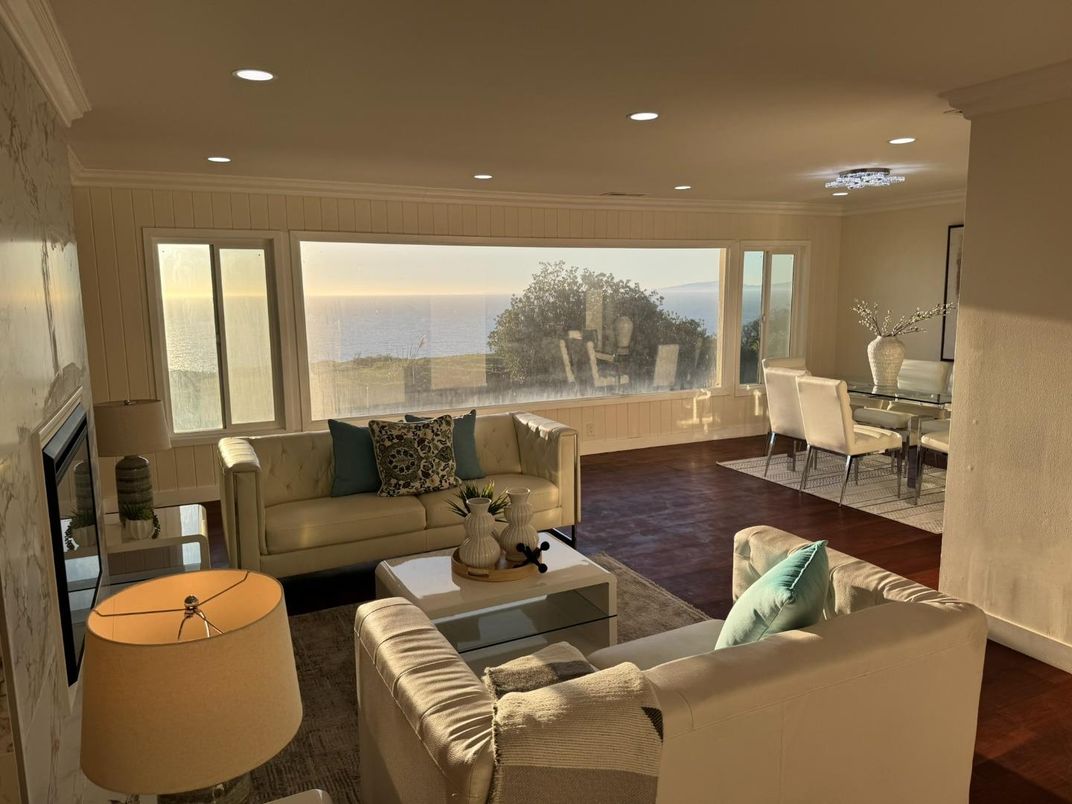 Dining room, Fireplace, Interior, Living room, Recessed Lighting, Water, Wood Texture Flooring