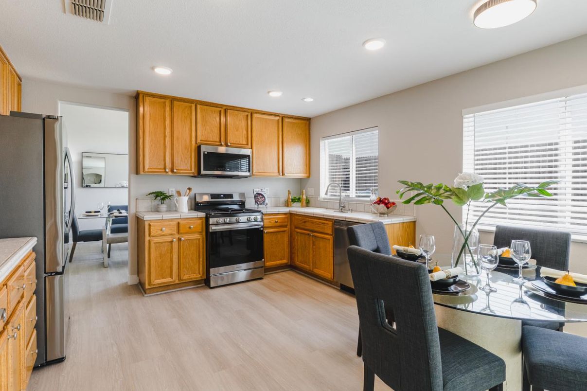 Dining room, Interior, Kitchen, Recessed Lighting, Stainless Steel Appliances, Wood Texture Flooring