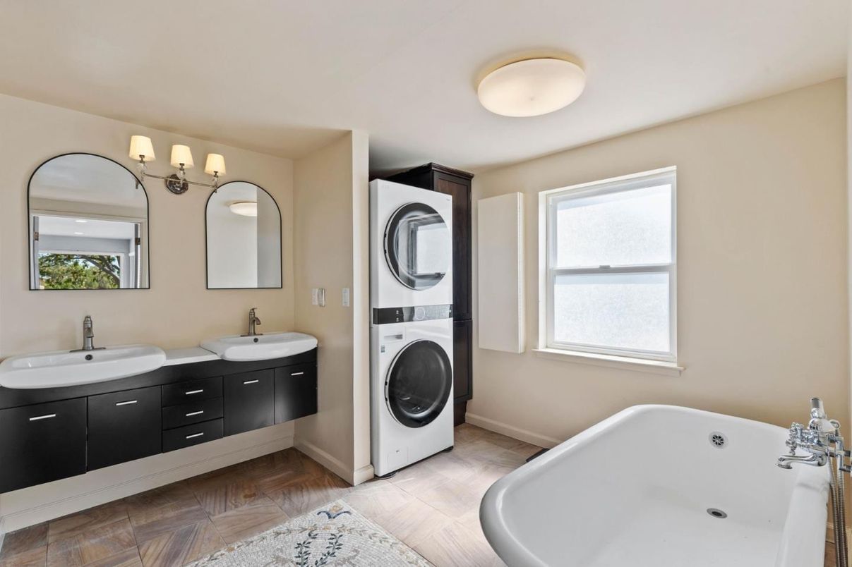Bathroom, Dual Sink Vanities, Interior, Washer, Wood Texture Flooring
