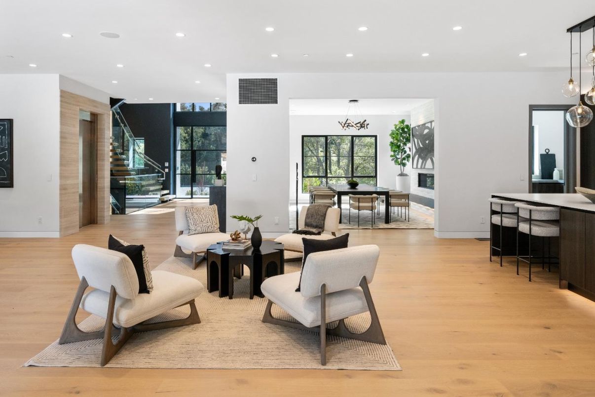 Dining room, Fireplace, Interior, Living room, Pendant Lights, Recessed Lighting, Wood Texture Flooring