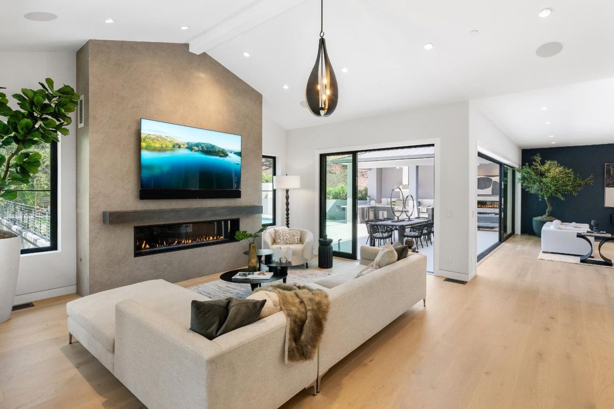 Dining room, Fireplace, Interior, Living room, Pendant Lights, Recessed Lighting, Wood Texture Flooring