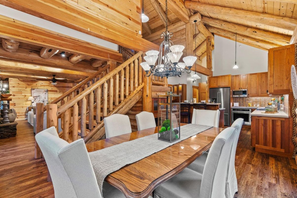 Chandelier, Dining room, Interior, Kitchen, Living room, Pendant Lights, Stainless Steel Appliances, Wooden Beams, Wooden Ceilings, Wood Texture Flooring, Wooden Walls