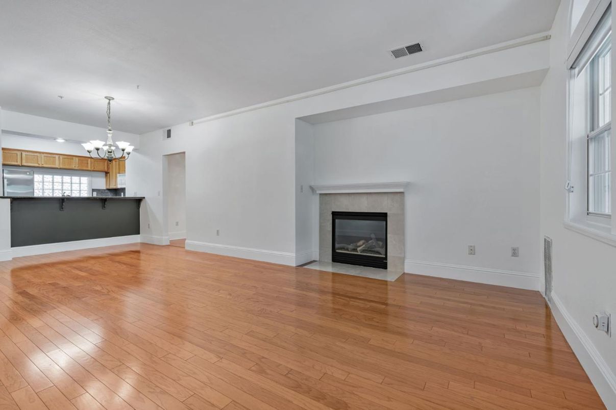 Chandelier, Empty room, Fireplace, Interior, Recessed Lighting, Wood Texture Flooring