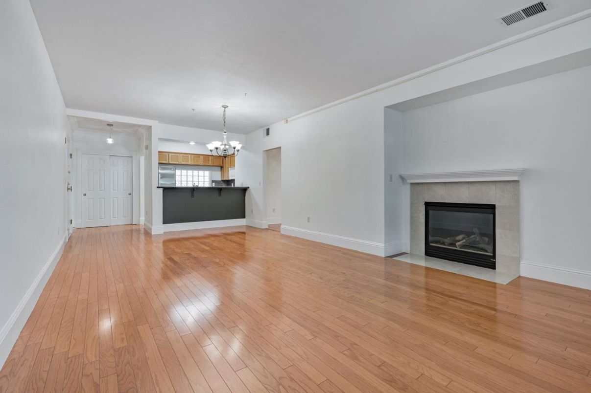 Chandelier, Empty room, Fireplace, Interior, Kitchen, Pendant Lights, Wood Texture Flooring